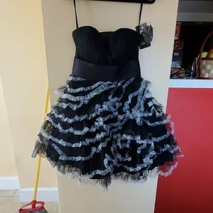 I am selling a black and white prom dress.